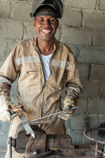 istock Welder At Work In The Factory 1336192986
