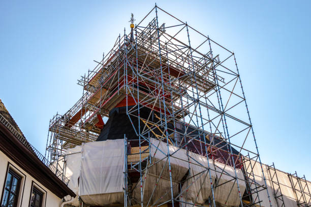 istock Church tower in scaffolding 1336193579