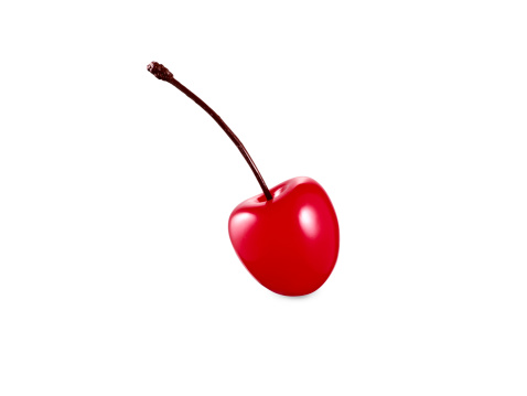 a maraschino cherry isolated on white