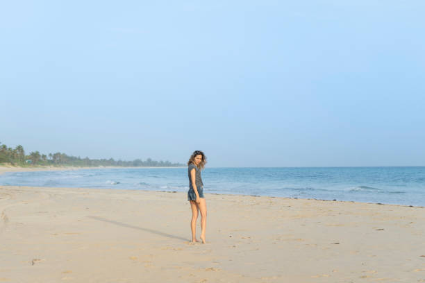 istock Young woman on the beach 1336198394