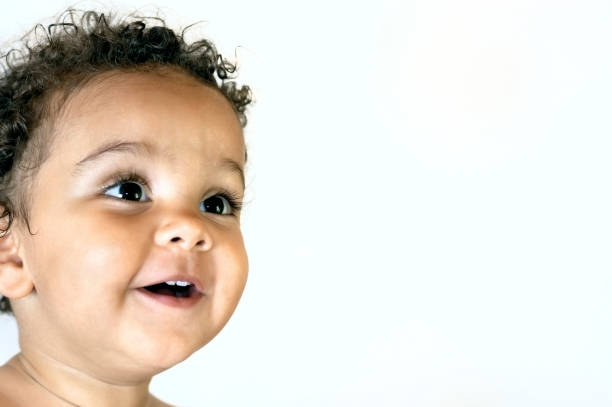 istock Smiling baby against white background 133620213