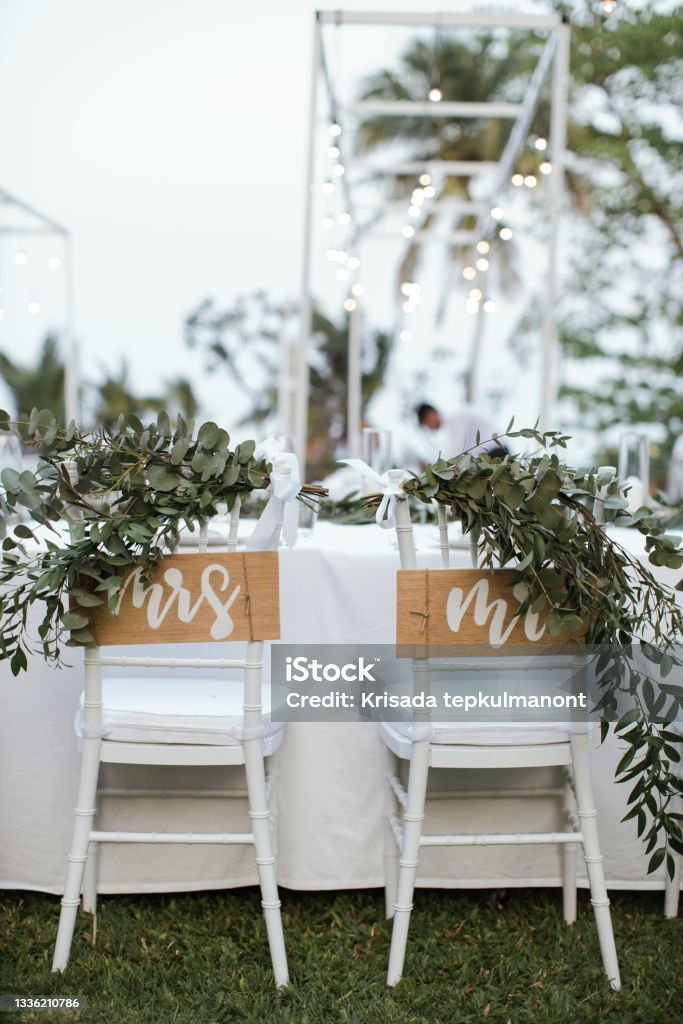 Wedding reception chairs for wedding couple with bride and groom wording . Wedding Stock Photo