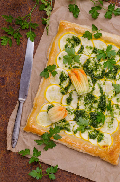 istock Square vegetable pie with green sauce 1336210790