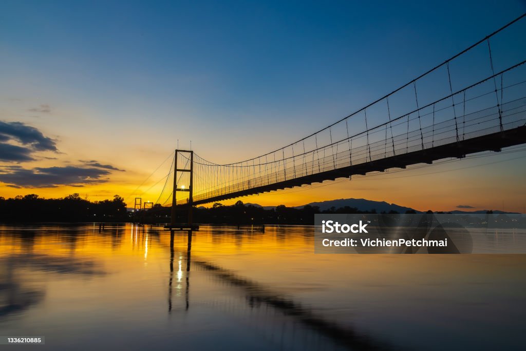 Night suspension bridge suspension bridge with river reflection at twilight Clifton - New Jersey Stock Photo