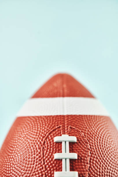 istock American football against blue background 1336211032