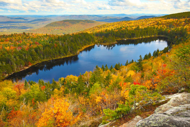 istock Looking down on Lake Solitude from Mt. Sunapee, New Hampshire. 1336214650