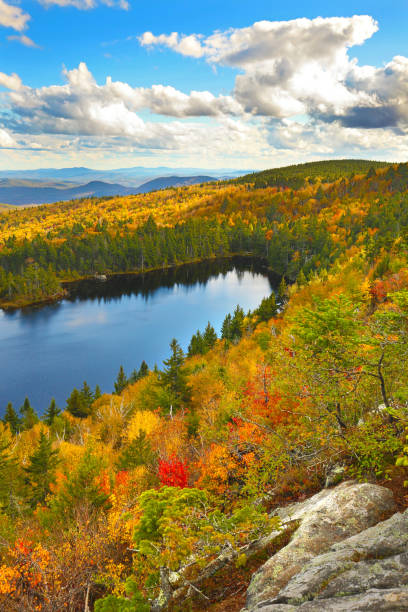 istock Looking down on Lake Solitude from Mt. Sunapee, New Hampshire. 1336214665