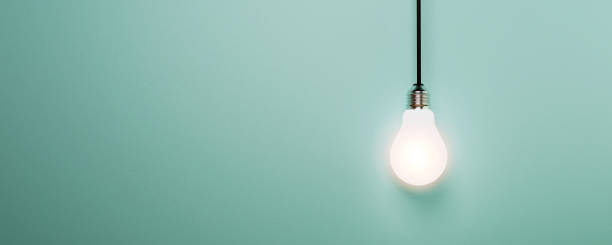 istock One hanging light bulb glowing on blue background for creative thinking idea and innovation concept by 3d render. 1336215584