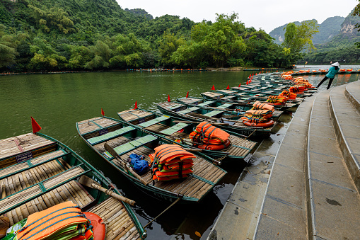 Trang An, Ninh Binh, Vietnam - November 28, 2019:The tourists rowboats of Trang An in Vietnam