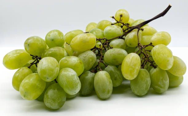 Fresh green grapes isolated on white background. stock photo
