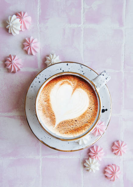 istock Cup with coffee and small meringues 1336222981