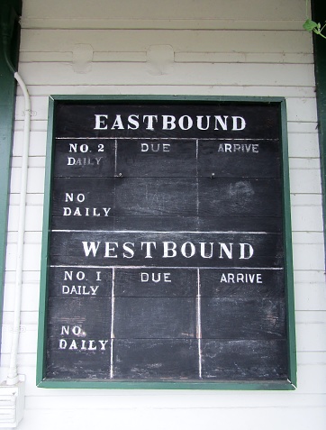 Old fashion train station time board. Fort Langley, British Columbia, Canada.