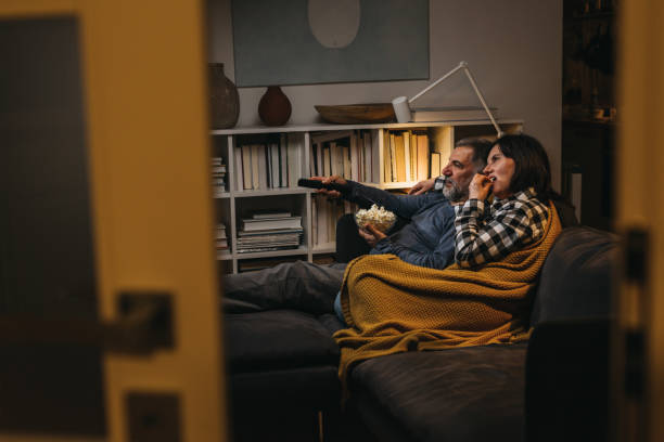 istock couple relaxing at home 1336224522