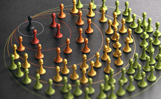 3D illustration of pawns over black backgound with circles. Concept of influencer marketing and spheres of influence.