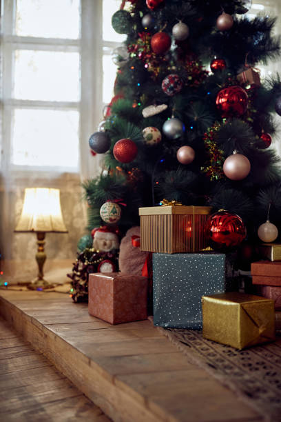 istock Wrapped gifts under a Christmas tree at home. 1336230370