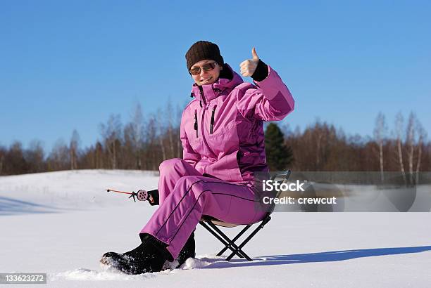 Winter Hobby Stock Photo - Download Image Now - Ice Fishing, Women, One Woman Only