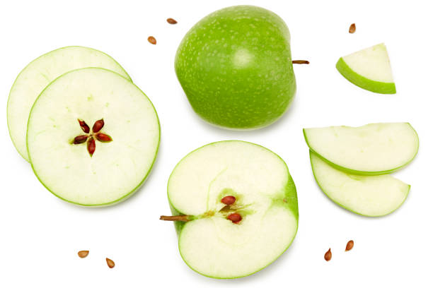 istock green apple with slices isolated on a white background. top view. clipping path 1336233788
