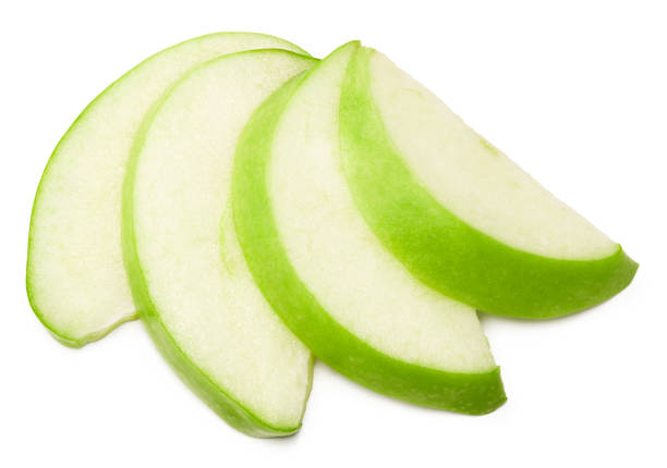 istock green apple with slices isolated on a white background. top view. clipping path 1336233790