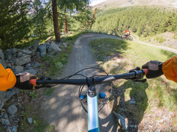istock Mountain bikers on trail, POV 1336241244
