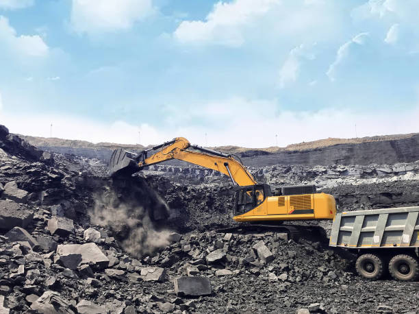 istock Heavy mechanical excavator operates on the construction site 1336243934
