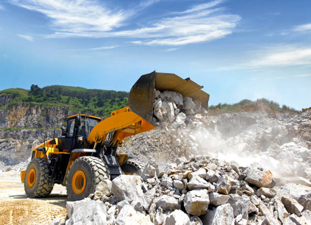 istock Heavy mechanical Bulldozer operates on the construction site 1336244015
