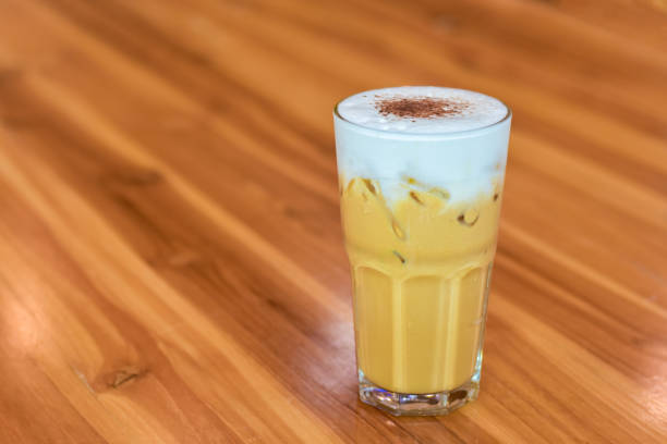 istock Ice coffee on a wooden table 1336246942