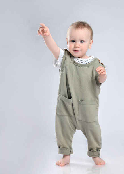 istock First steps of baby isolated on white background 1336248192