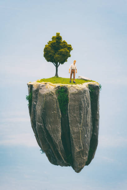 istock Miniature Businessman, Master Of His World 1336248264