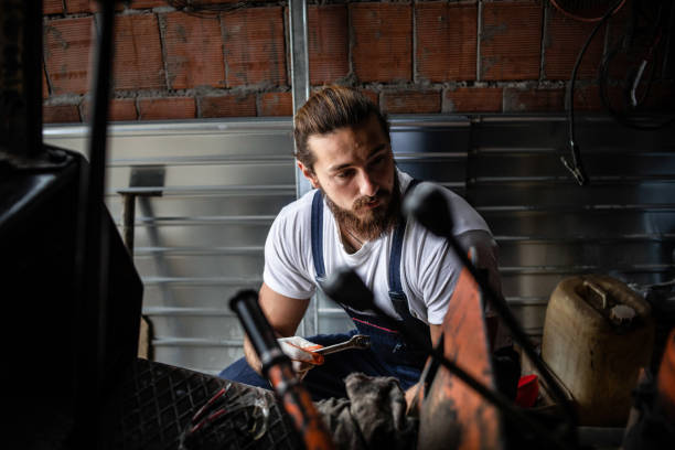 istock The man works in a mechanic's workshop. 1336252304
