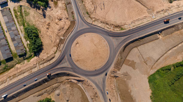 istock Top down aerial view of a traffic roundabout. Solving the problem of jams. 1336254645