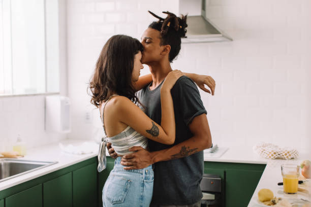 istock Passionate young couple bonding in the kitchen 1336260322
