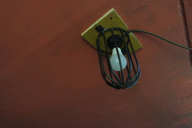 istock This is a photo of a white electric light bulb with an iron shield 1336260671