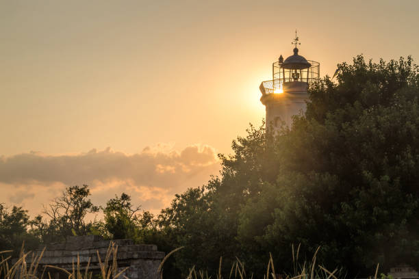 istock Tower of the old lighthouse against the evening sky 1336262553