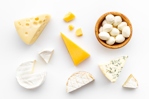 Dairy products - various types of cheese top view.