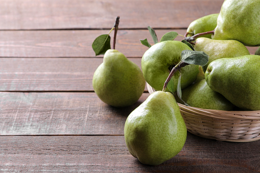 Fresh organic pears on white background