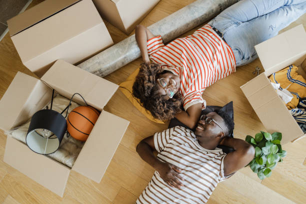istock Young couple enjoys a new home 1336269031