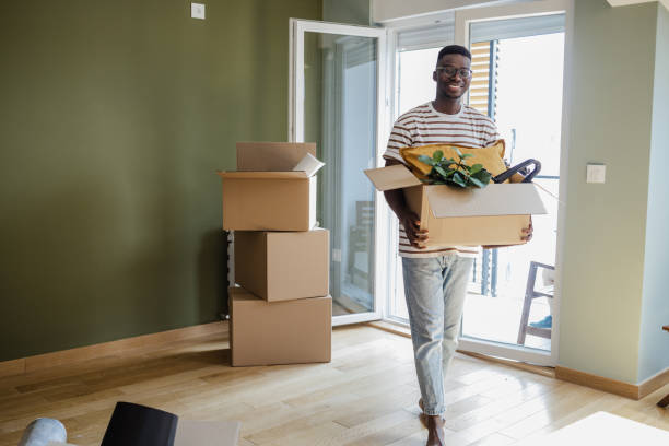 istock Young man moving into a new apartment 1336269100