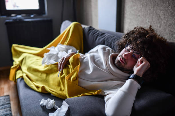 istock Male Falling Asleep After Feeling Tired By COVID-19 Symptoms 1336271837
