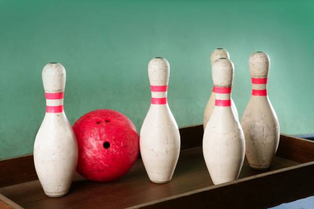 Bowling still life red ball over green background