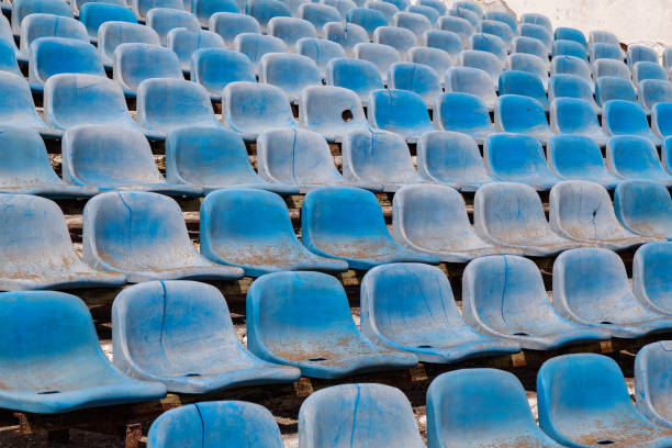 istock Destroyed stadium stands. Broken fan chairs. Selective focus 1336272757