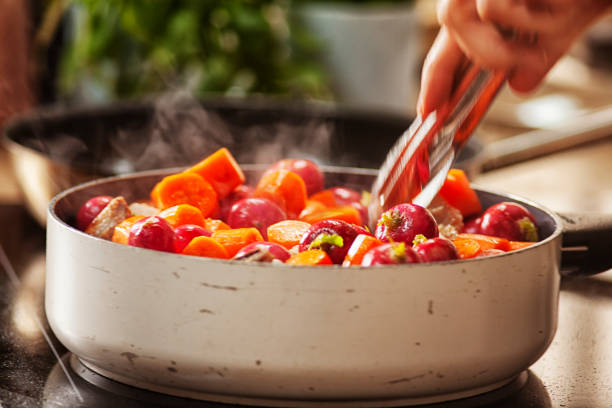 istock fried carrots in a pan. roasted vegetables 1336272924