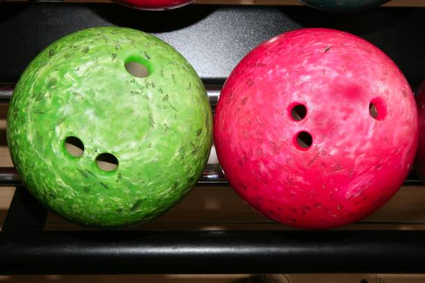 istock Bowling balls red green closeup row 1336273584
