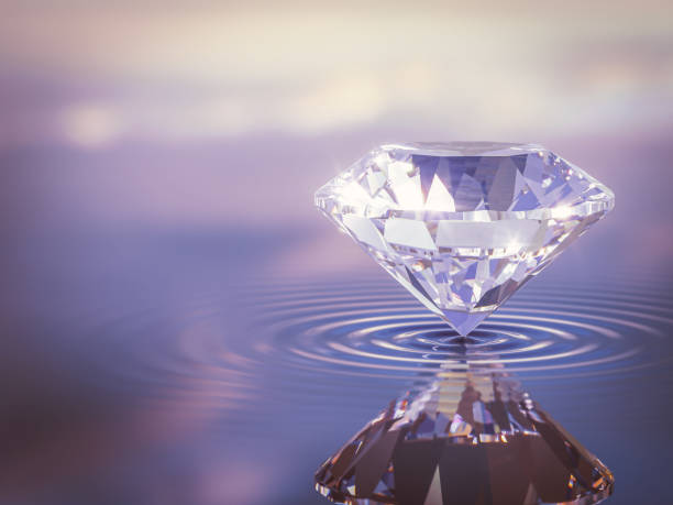 istock Luxury Shinning Diamond Balanced on Rippled Water Surface with Reflected Sky Background, Diamond Wallpaper, 1336275881