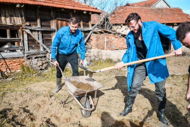 Farm Workers Finishing Field Digging Outside