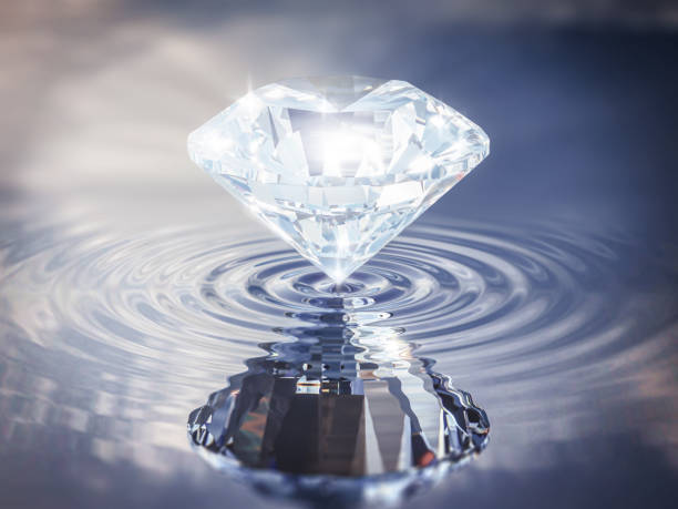 istock Luxury Shinning Diamond Balanced on Rippled Water Surface with Reflected Sky Background, Diamond Wallpaper, 1336276248