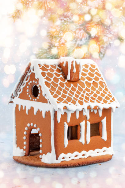 istock Christmas greeting card with gingerbread house 1336277373