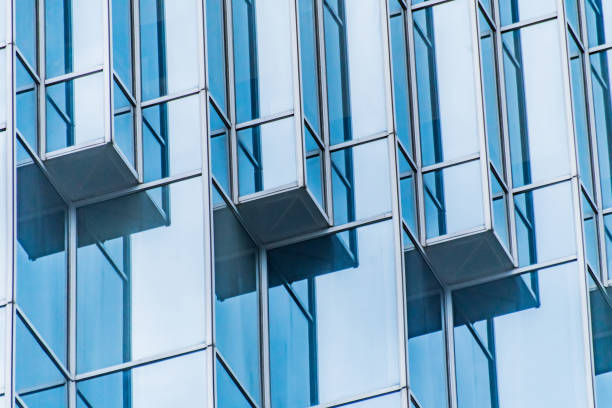 istock Architecture details Modern Building Glass facade Business background 1336280528