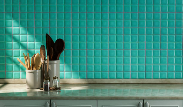 istock Kitchen counter with various kitchen utensils on it with turquoise tiled wall, under morning sunshine, 3d Rendering 1336283843