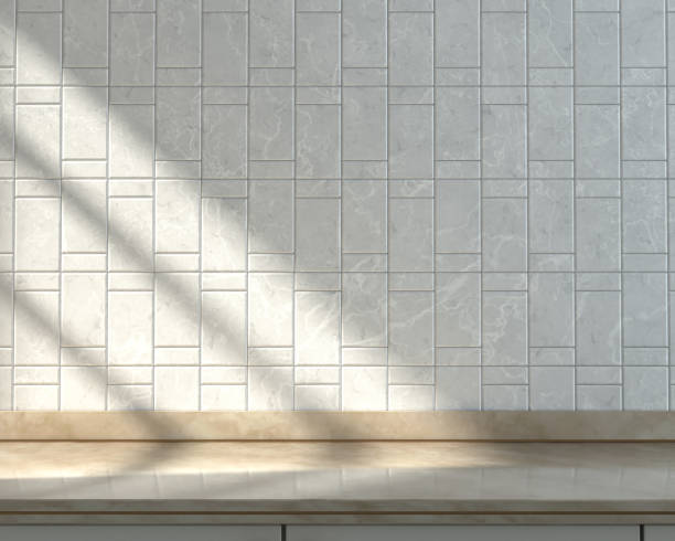 istock Empty marbel kitchen counter,  alternating white tiled wall under morning sunshine, warm kitchen scene, 3d Rendering 1336284973