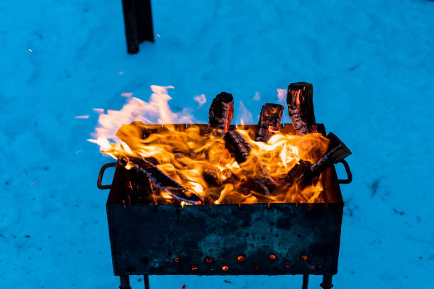 istock Brazier with fire and coals for cooking on the fire. 1336287445
